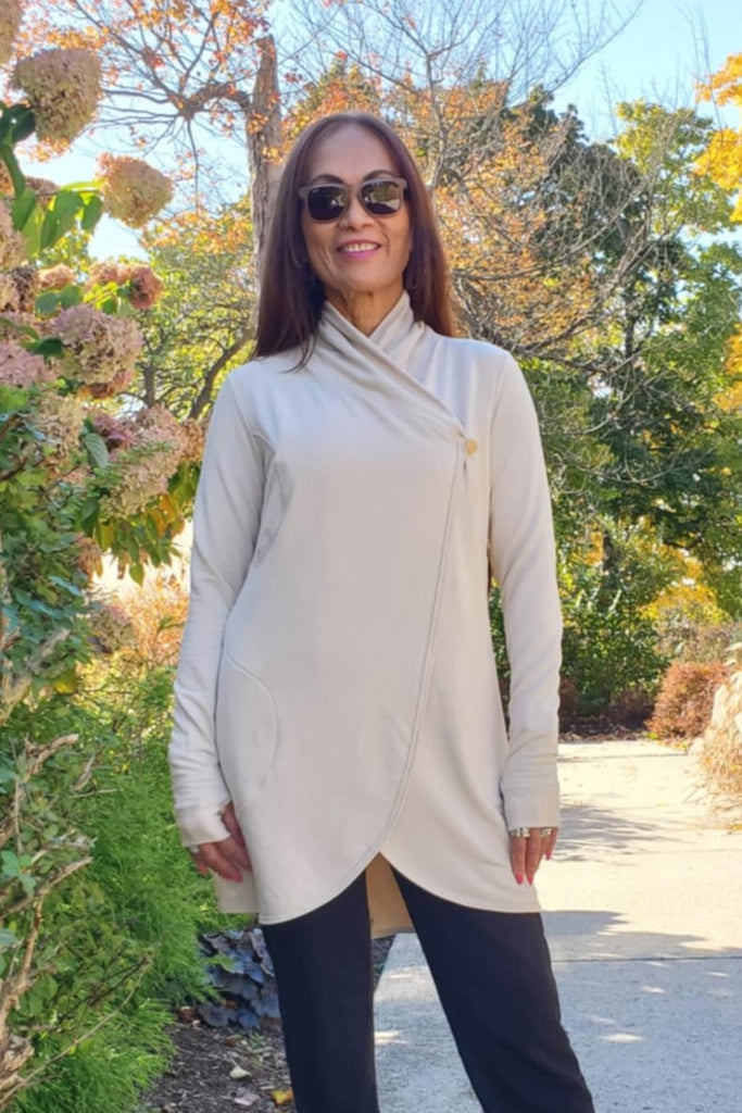 Cocoon wrap for women with pockets, cozy and comfortable to wear, thumb holes in sleeves.  Biscotti colour.  Made in Canada