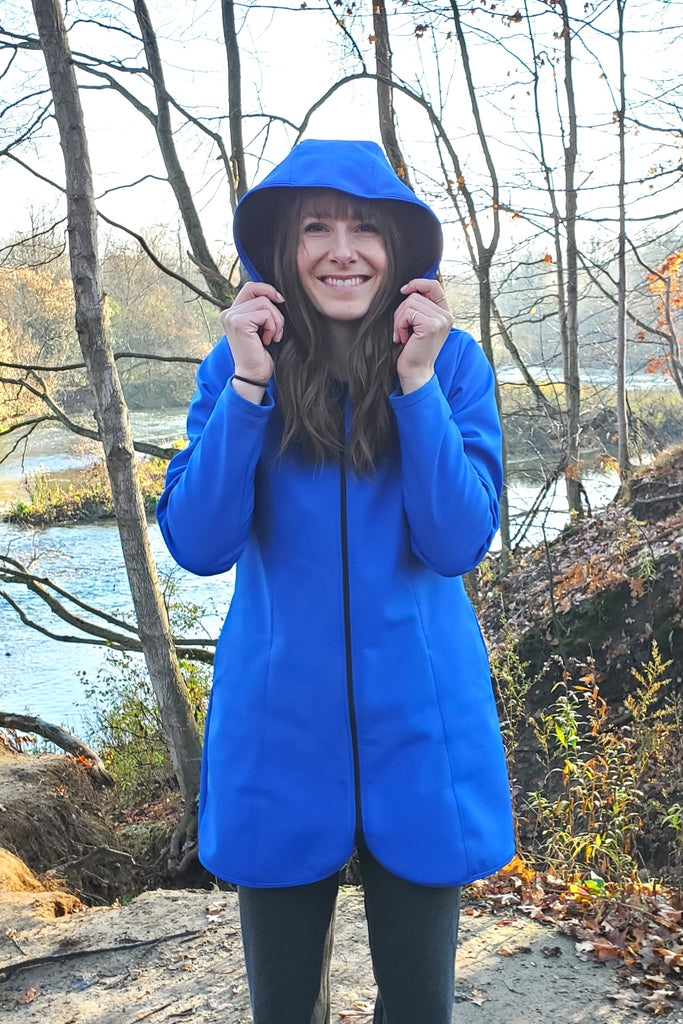Long length waterproof and Windproof, fleece lined blue jacket.  Made in Canada