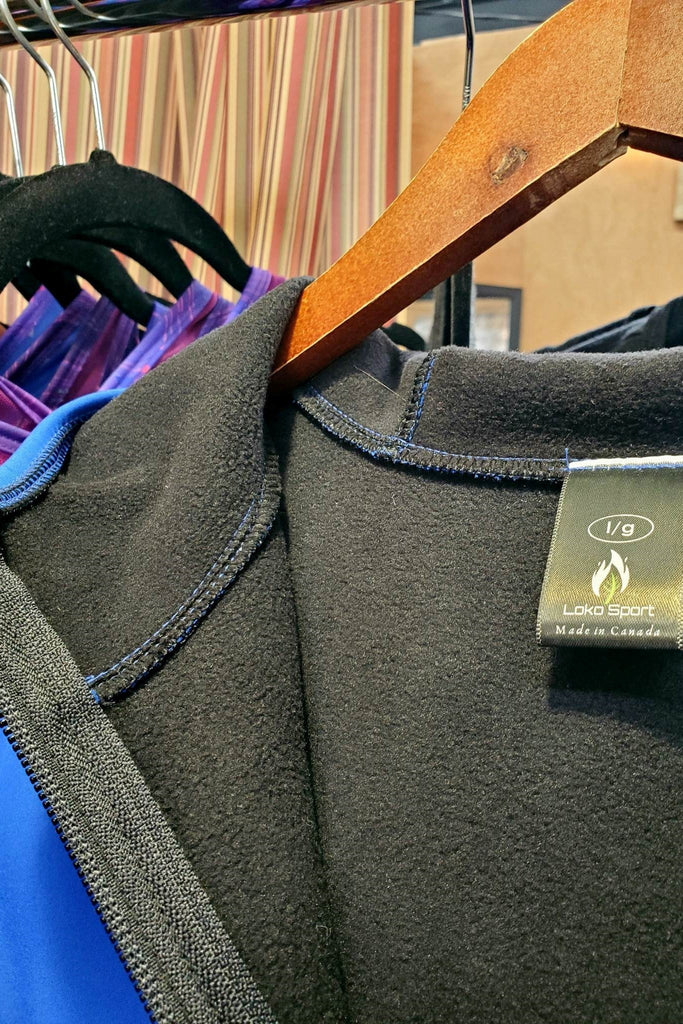 Long length waterproof and Windproof, fleece lined jacket red. Made in Canada