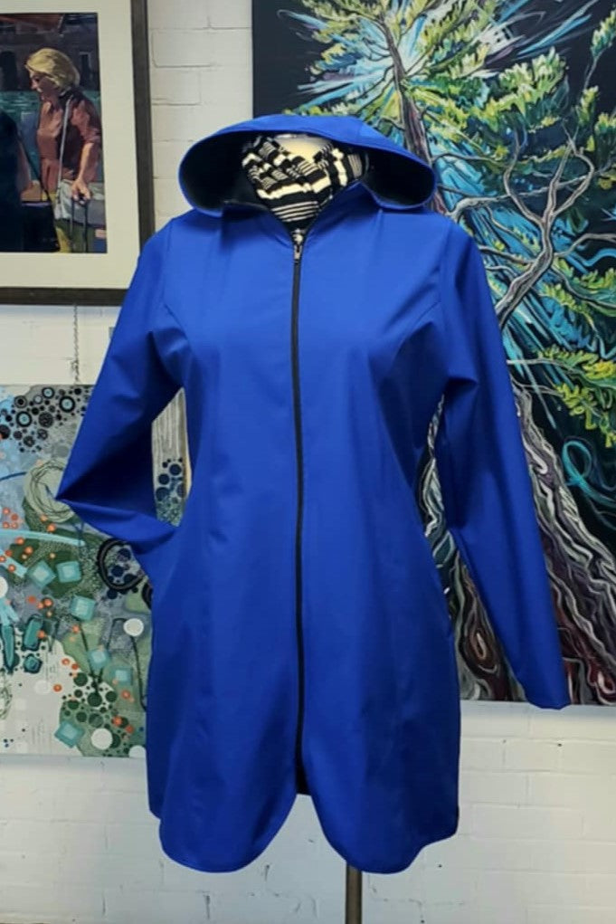 Hooded waterproof long jacket in royal.  Made in Canada