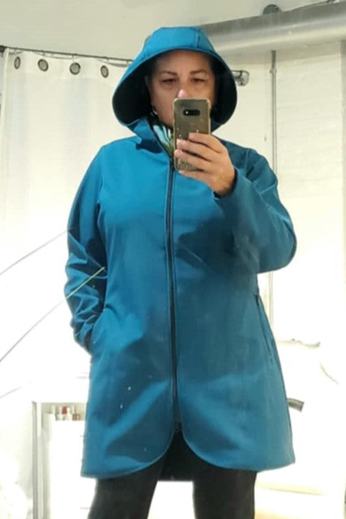 breathable waterproof wickable windproof made in Canada recycled fabric ykk zippers transformative teal fleecelined