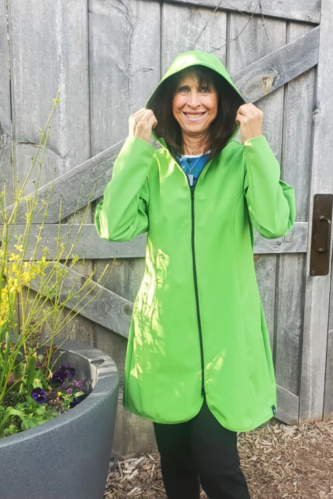 Hooded waterproof long jacket in green.  Made in Canada