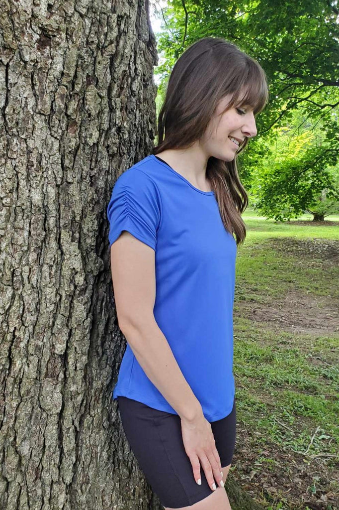 Short sleeve technical fabric tee with crew neck, ruched sleeve detail, periwinkle colour