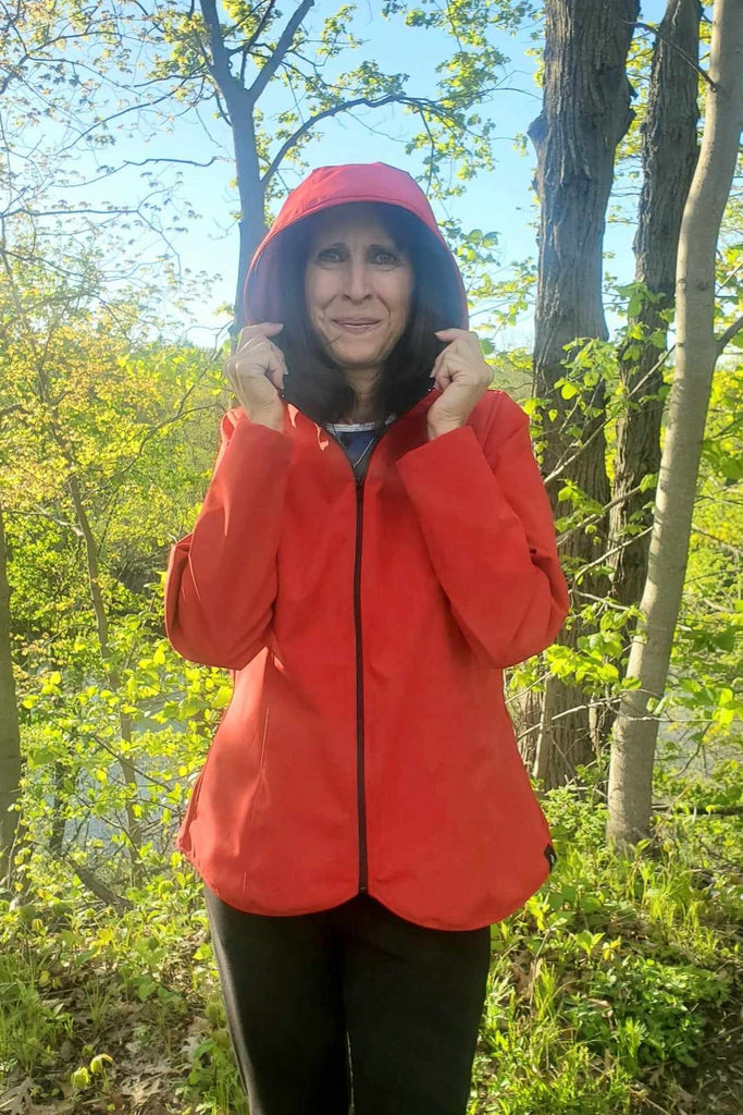 Hooded waterproof short jacket in red.  Made in Canada