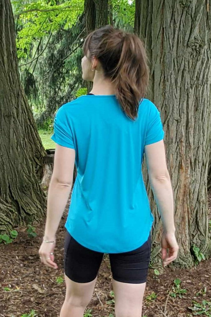 Short sleeve technical fabric tee with crew neck, ruched sleeve detail, blue colour