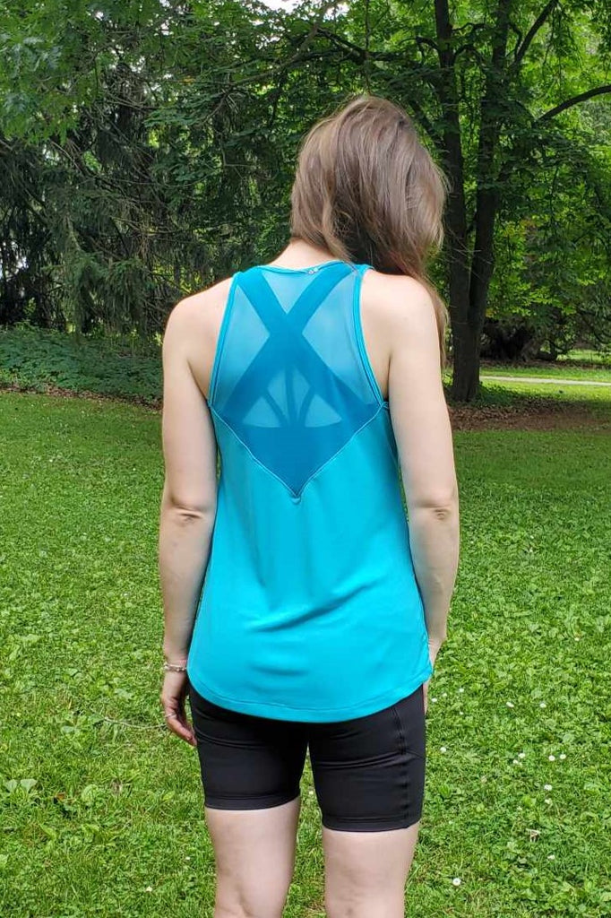 Blue tank top, breathable, fast-drying, wickable fabiric.  Mesh back detail, long length.  Made in Canada