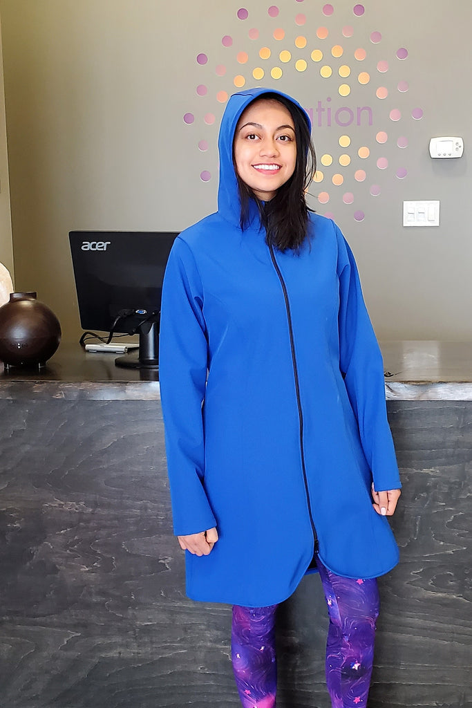 Long length waterproof and Windproof, fleece lined blue jacket.  Made in Canada