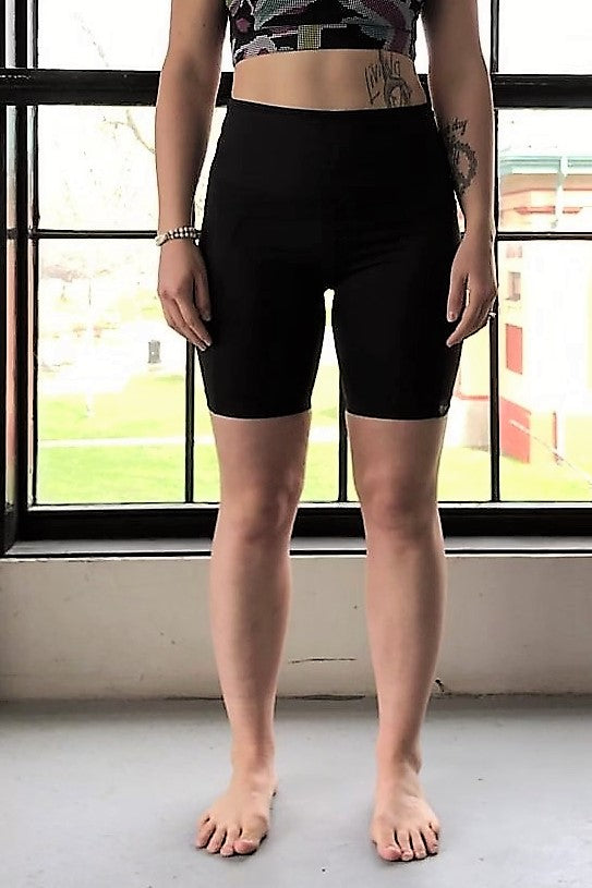 Black activewear shorts with side pockets.  Made in Canada